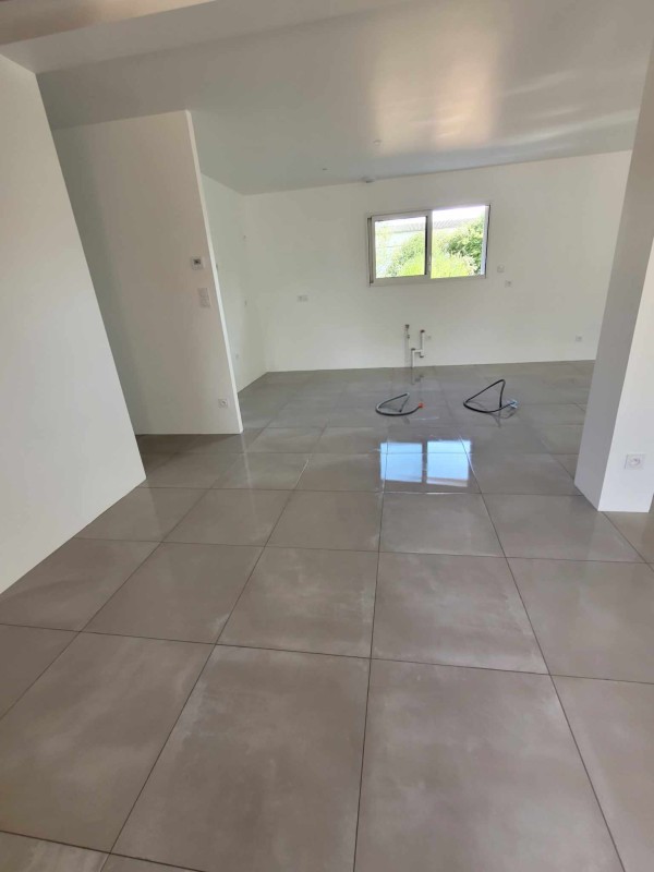 Remise en état du carrelage d'une maison neuve Marbeuf 27